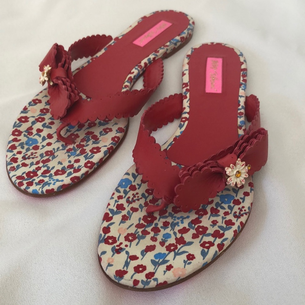 Betsey Johnson red leather flip flop sandals.